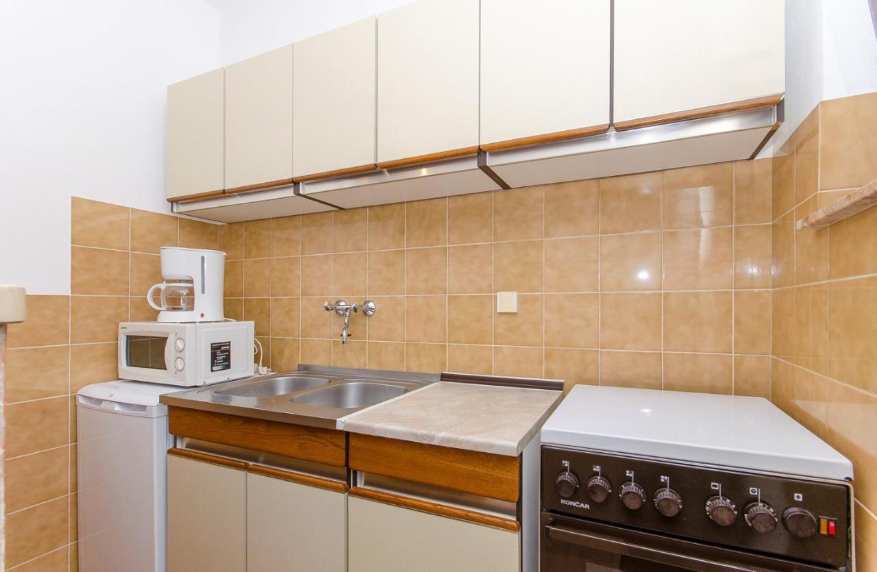 Apartments Goran Постира Екстериор снимка